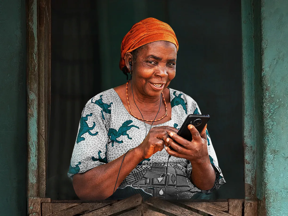A smiling BidBoxx member checking her savings on her phone